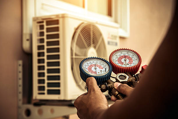 Professional Air Conditioning Service technician working in Pueblo, CO